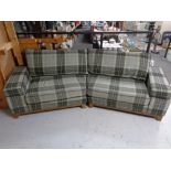 A shaped settee in tartan print