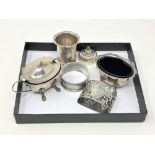 A group of miscellaneous silver comprising pair of condiments with glass liners, two napkin rings,