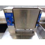 A Prince Castle stainless steel roller grill