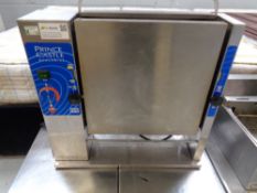 A Prince Castle stainless steel roller grill