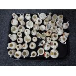 A tray of fifty pieces of crested china