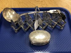 A silver trinket box, together with an ornate EPNS toast rack and a large ladle.