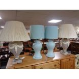 Two pairs of pottery table lamps with shades