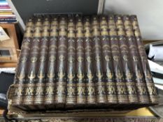 A box of fourteen antique dictionaries