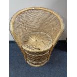 A wicker tub chair