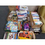 A pallet of paperbacked novels and children's books