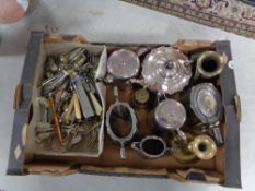 A box of metal ware, part tea services, brass candlesticks,