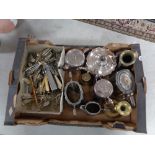 A box of metal ware, part tea services, brass candlesticks,