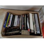 A box of books and magazines relating to the Beatles
