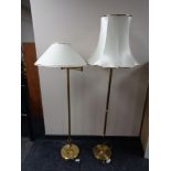 A brass angle poise floor lamp together with a brass standard lamp with shade