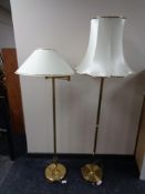 A brass angle poise floor lamp together with a brass standard lamp with shade