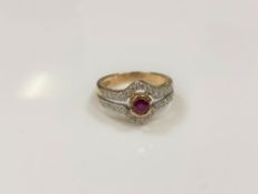 A 9ct gold diamond and ruby ring, size L/M.