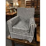 A contemporary black and white printed armchair
