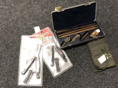 A cased gun cleaning kit,