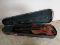 A twentieth century violin and bow in coffin case