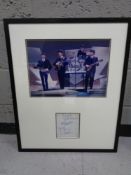 A framed Beatles montage bearing printed signatures
