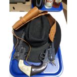 A tray of two toy revolvers, cowboy hat,