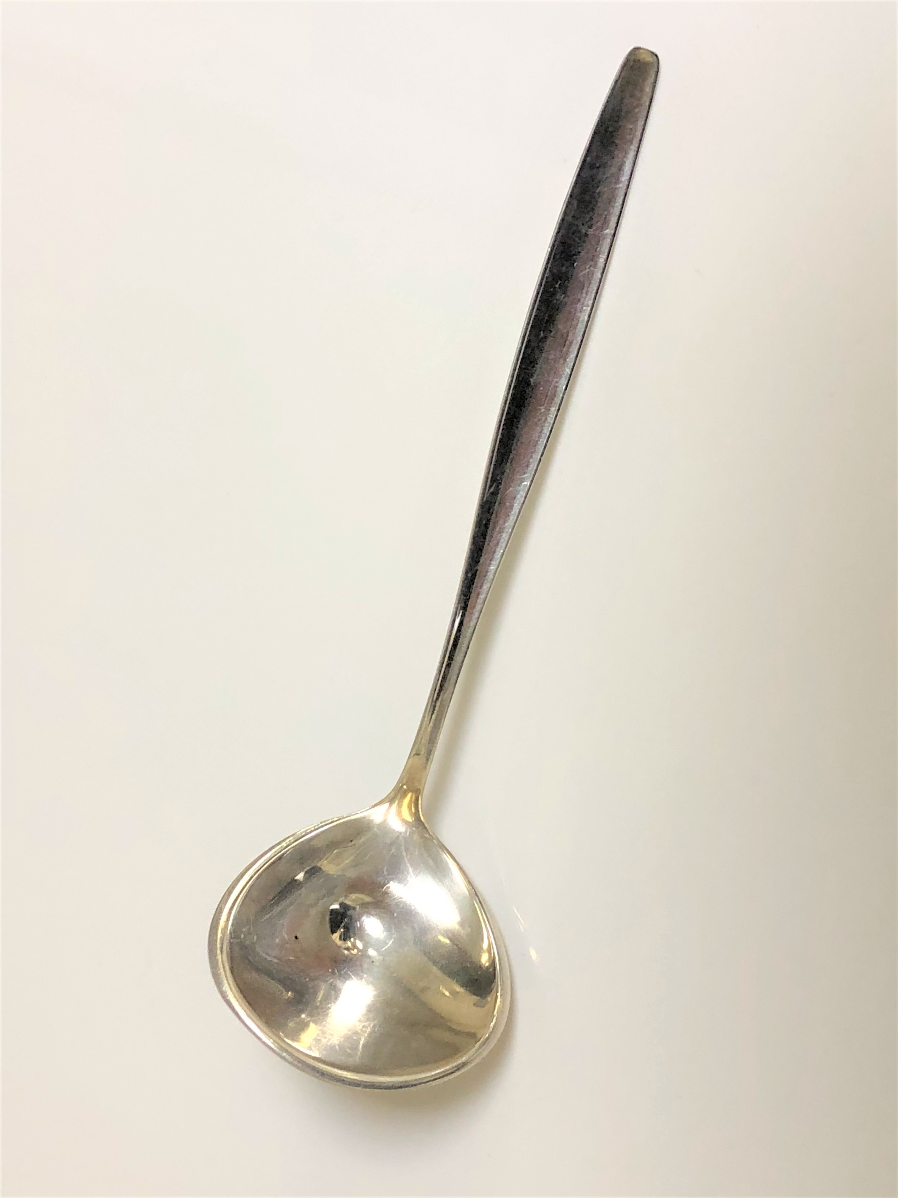 A George Jensen silver ladle
