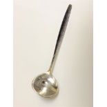 A George Jensen silver ladle