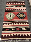 An old woolen Kilim rug,