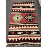 An old woolen Kilim rug,