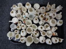 A tray of fifty pieces of crested china