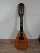 An eight string bowl back mandolin