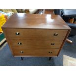 A twentieth century teak beautility three drawer chest