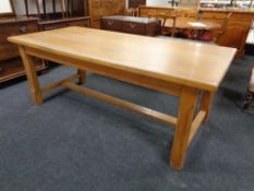 A contemporary oak refectory oak dining table