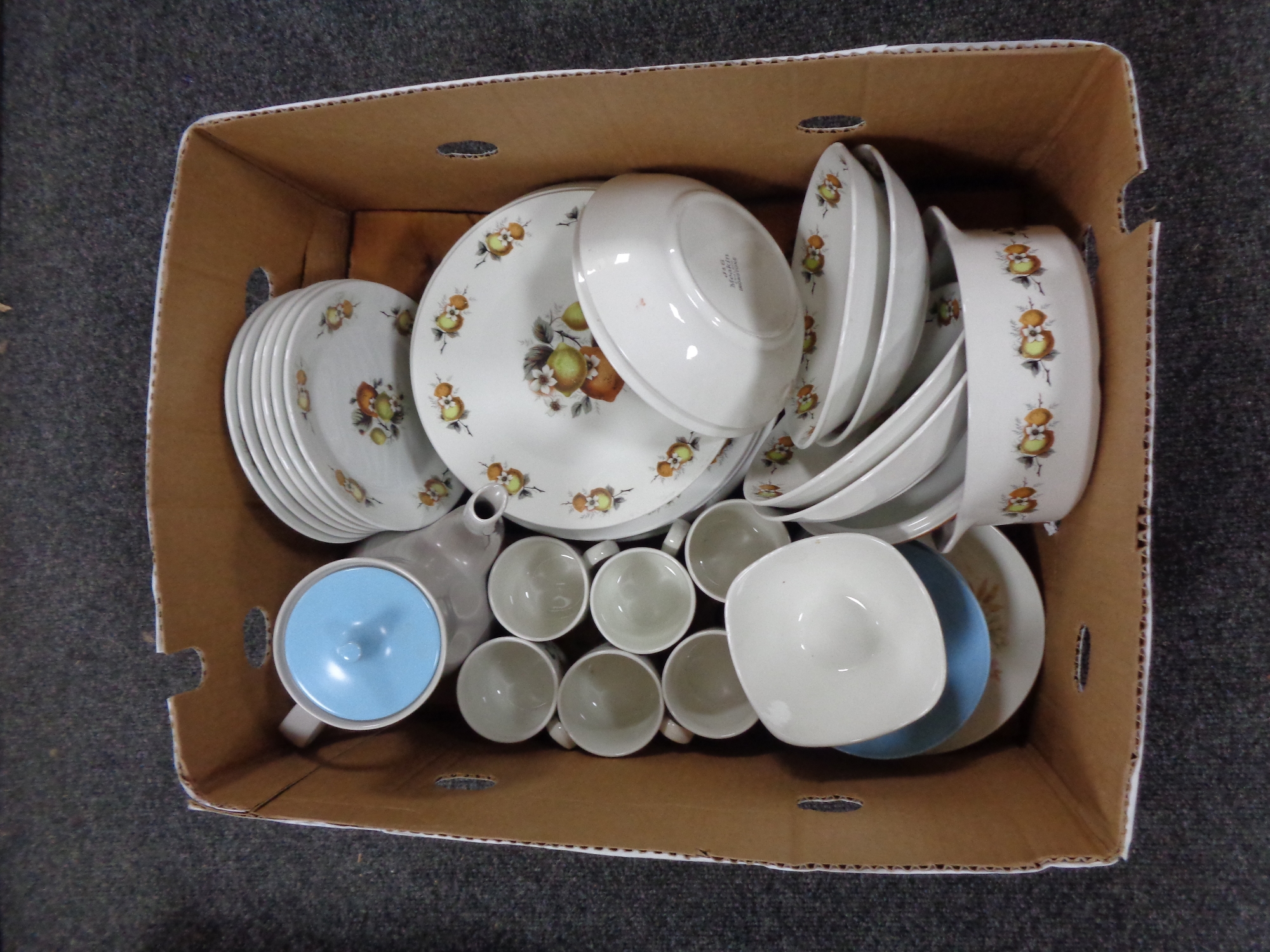 A box of J & G Meakin tea and dinner ware