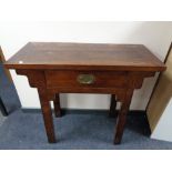 A Chinese style console table fitted with a drawer