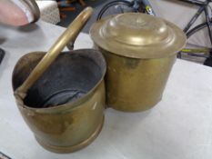 An antique brass coal bucket with tongues together with further lidded coal receiver