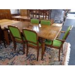 A twentieth century mahogany Queen Anne style extending mahogany dining table with leaf together