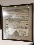 A nineteenth century sampler by Elizabeth Supton dated 1851, framed.