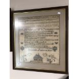 A nineteenth century sampler by Elizabeth Supton dated 1851, framed.