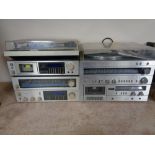 A Sanyo stereo component system together with four Pioneer hifi separates
