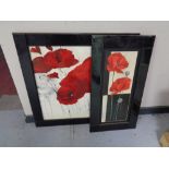 A pair of poppy prints in black glass frames