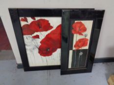 A pair of poppy prints in black glass frames