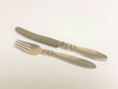 A George Jensen silver knife and fork