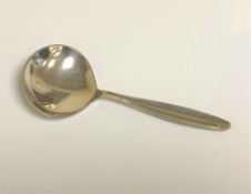 A George Jensen silver caddy spoon