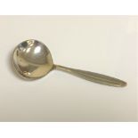A George Jensen silver caddy spoon