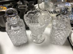 Two lead crystal whisky decanters together with a cut glass vase