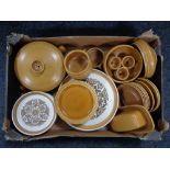 A box of Hornsea saffron dinner ware