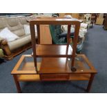 A mid century teak two tier trolley together with coffee table