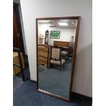 A contemporary bevelled hall mirror