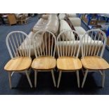 A set of four pine kitchen chairs