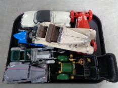 A tray of seven large scale diecast vehicles to include Burago and Franklin mint