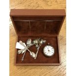 A silver pocket watch (a/f), together with three silver spoons and four further plated spoons.
