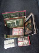 A box of cigarette cards in albums, frame and mounts,