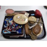 A tray of petitpoint dressing table set together with one other set,
